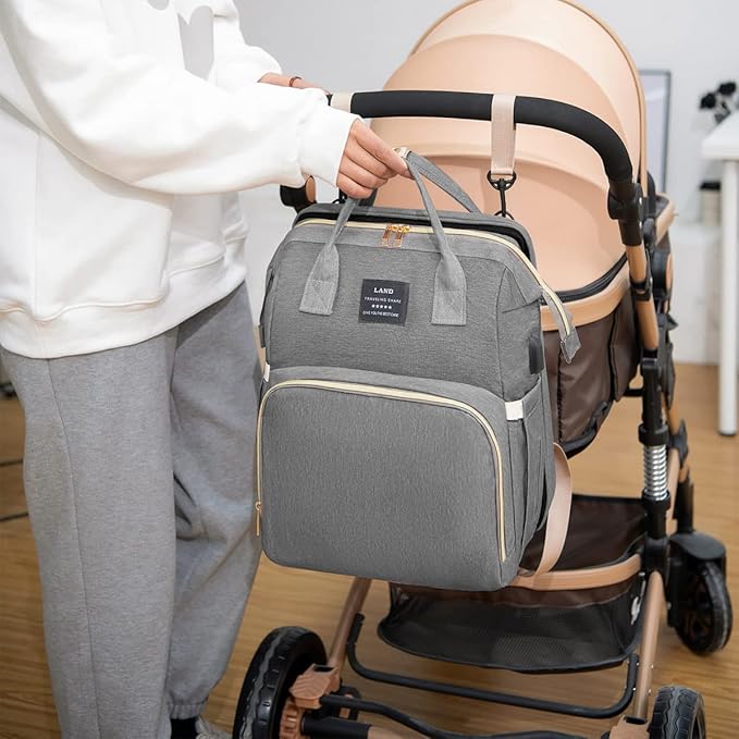 Mochila pañalera con cuna incorporada